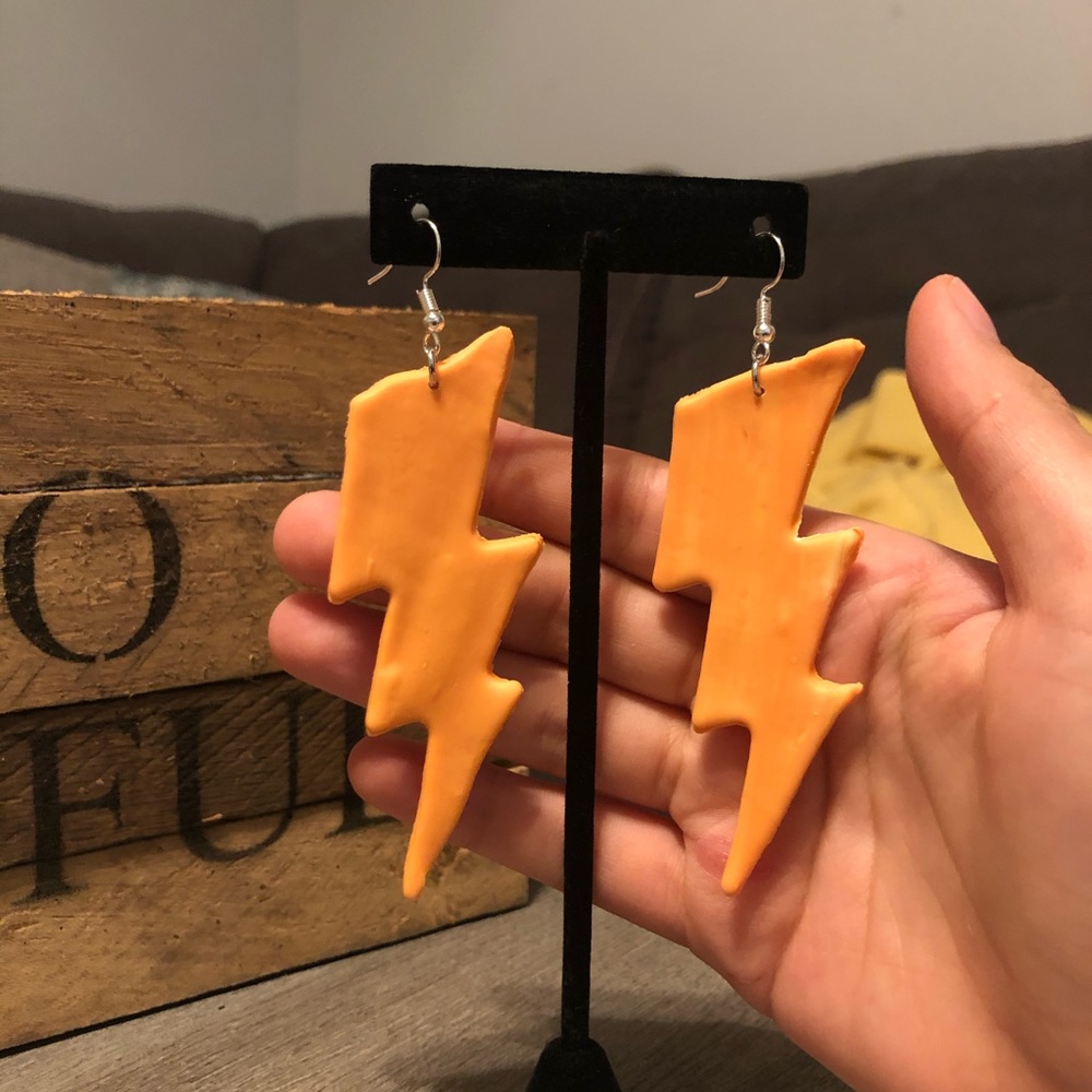 Orange lightning bolt earrings